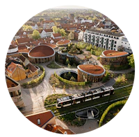 Billedet viser en cirkel med en natur by og tog